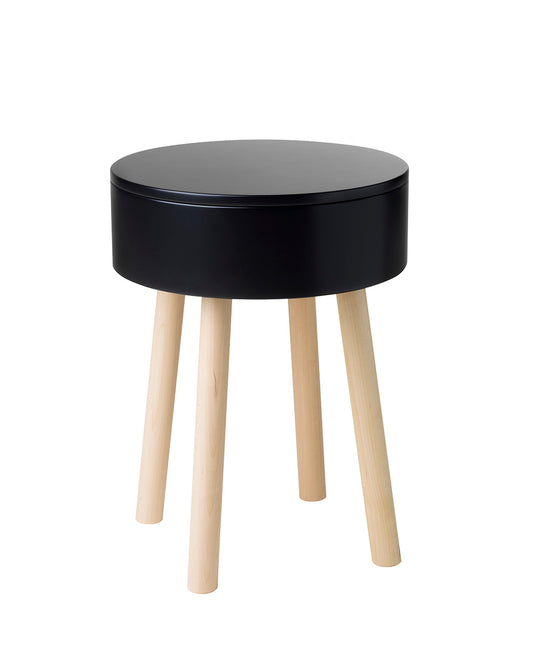Multifunctional Piilo stool in black. Piilo is a stool with storage space hidden inside its seat. Designed by Hanna Lantto. Made in Finland.